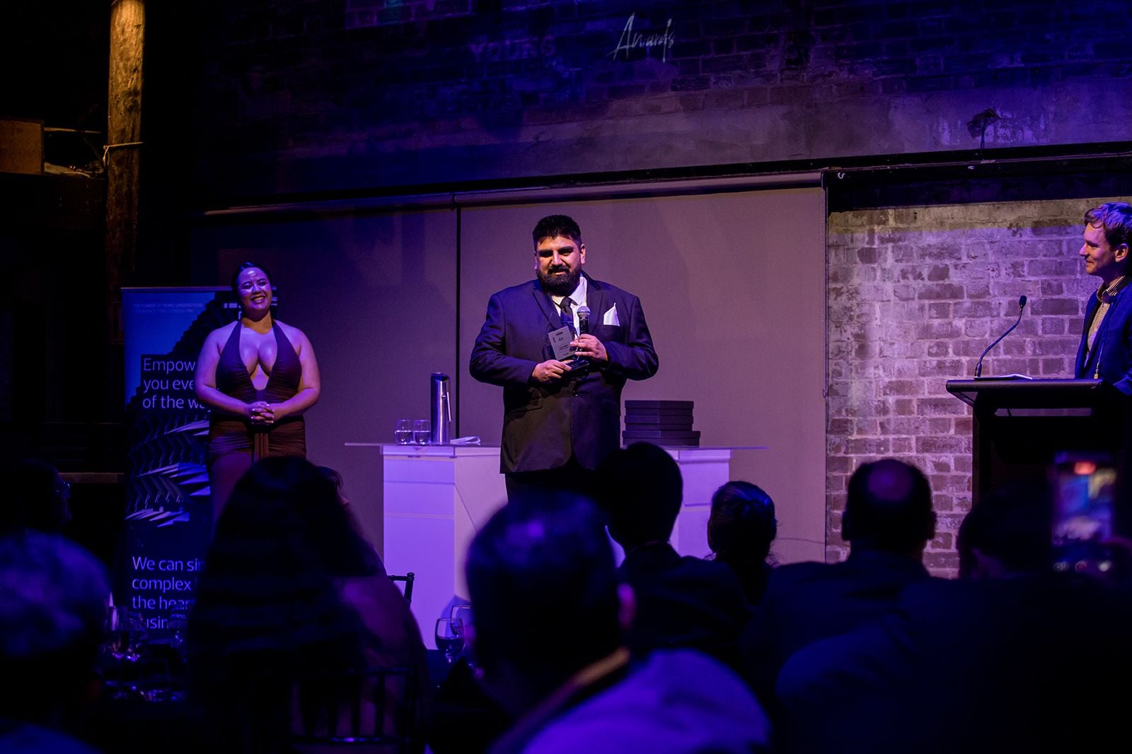 2025 Sydney Young Entrepreneur Awards Gala dinner Winners accepting trophies on stage at the 2025 Sydney Young Entrepreneur Awards
